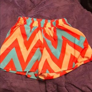 Orange and blue chevron print shorts